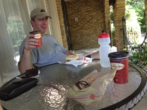 Corey and I enjoying his pre oil change ritual of Timmy's on the front porch.